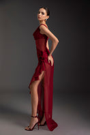 Elegant flaming muse gown by Le Thanh Hoa featuring flowing fabric and intricate details, perfect for formal occasions.