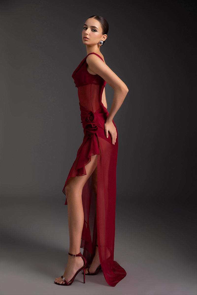 Elegant flaming muse gown by Le Thanh Hoa featuring flowing fabric and intricate details, perfect for formal occasions.