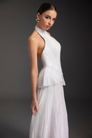 Elegant Snow Bloom gown by Le Thanh Hoa featuring intricate lace and flowing fabric, perfect for formal occasions.