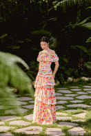 Do Long Blooming Oasis maxi dress displayed on a hanger, featuring floral print, flowing fabric, and elegant design.