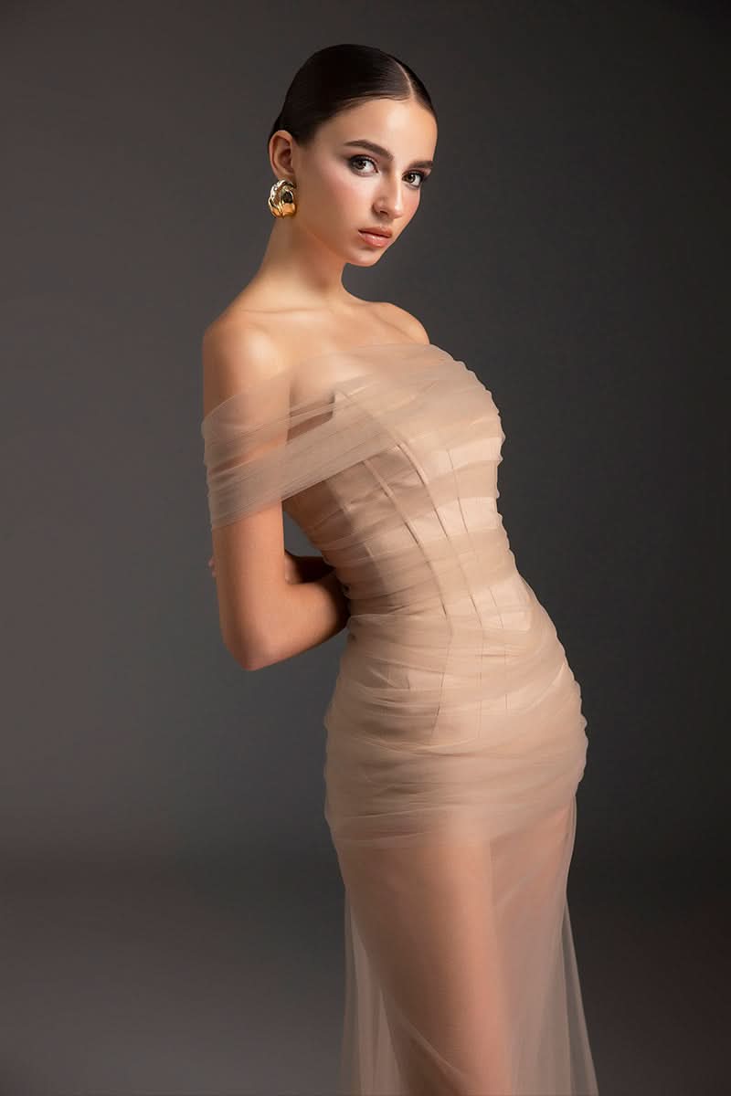 Le Thanh Hoa Blazing Desire gown featuring elegant design and flowing fabric, perfect for formal occasions.
