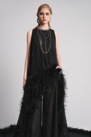 Black Le Thanh Hoa Nocturnal Warmth jumpsuit displayed on a hanger, showcasing its sleek design and comfortable fit.
