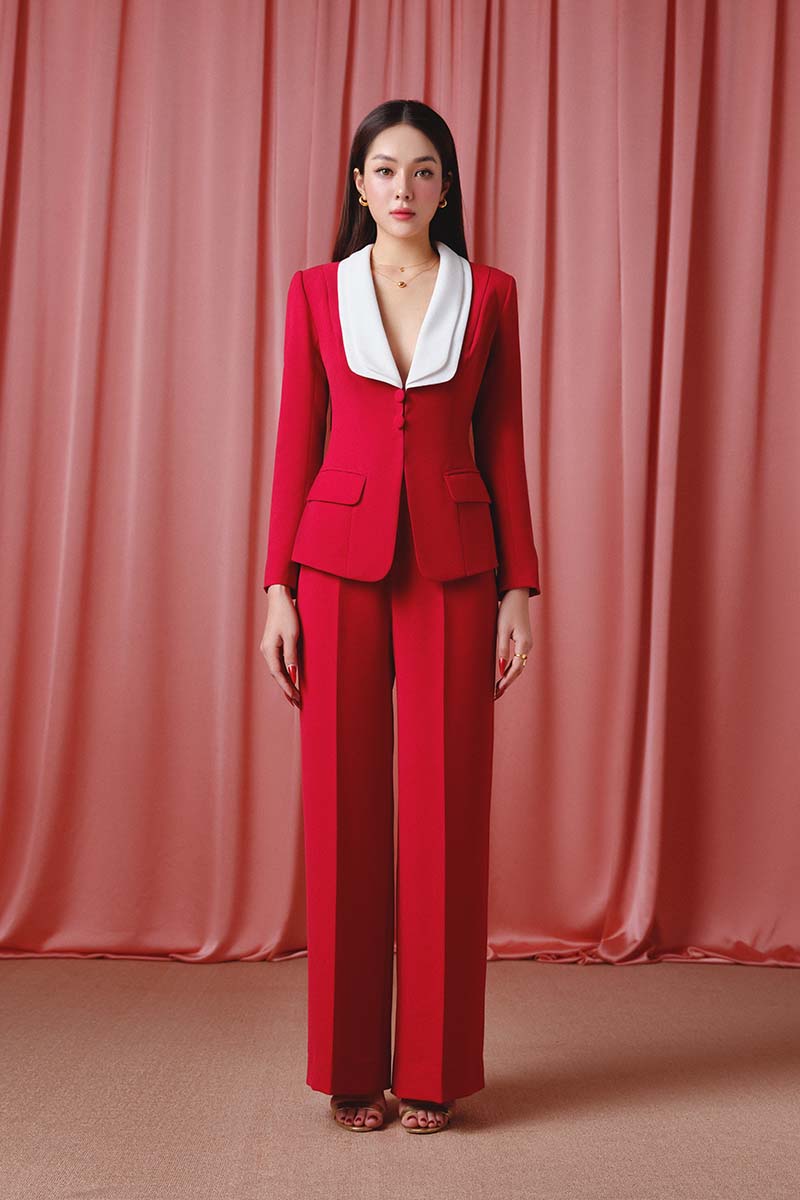Do Long crimson power suit set co-ords featuring a tailored blazer and matching pants, styled for a chic, modern look.