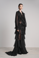 Black Le Thanh Hoa Raven Luxe Ruffles maxi dress with flowing fabric and ruffled details, full-length design, elegant and stylish.