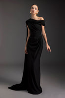 Le Thanh Hoa Midnight Serenade gown featuring elegant dark fabric and flowing design, perfect for formal evening events.