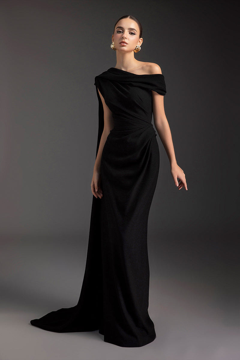 Le Thanh Hoa Midnight Serenade gown featuring elegant dark fabric and flowing design, perfect for formal evening events.