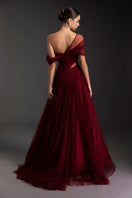 Le Thanh Hoa Lustrous Flame Gown displaying a shimmering, elegant evening dress with a flowing silhouette and intricate details.