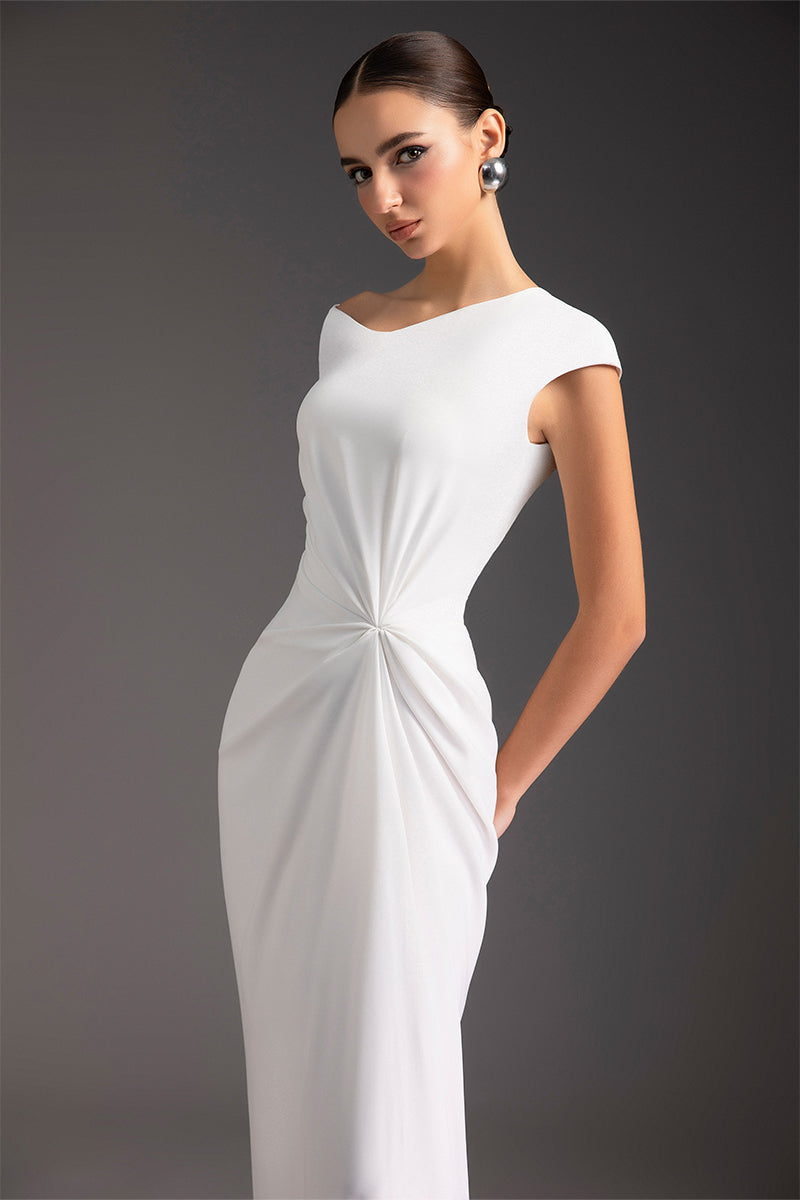 Elegant luminous pearl gown by Le Thanh Hoa featuring intricate beadwork and flowing fabric, perfect for formal occasions.