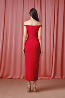 Elegant scarlet bloom gown by Do Long featuring flowing fabric and intricate design, perfect for formal occasions.