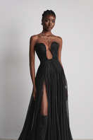Le Thanh Hoa Celestial Whisper gown in black with flowing fabric and elegant design, perfect for formal occasions.