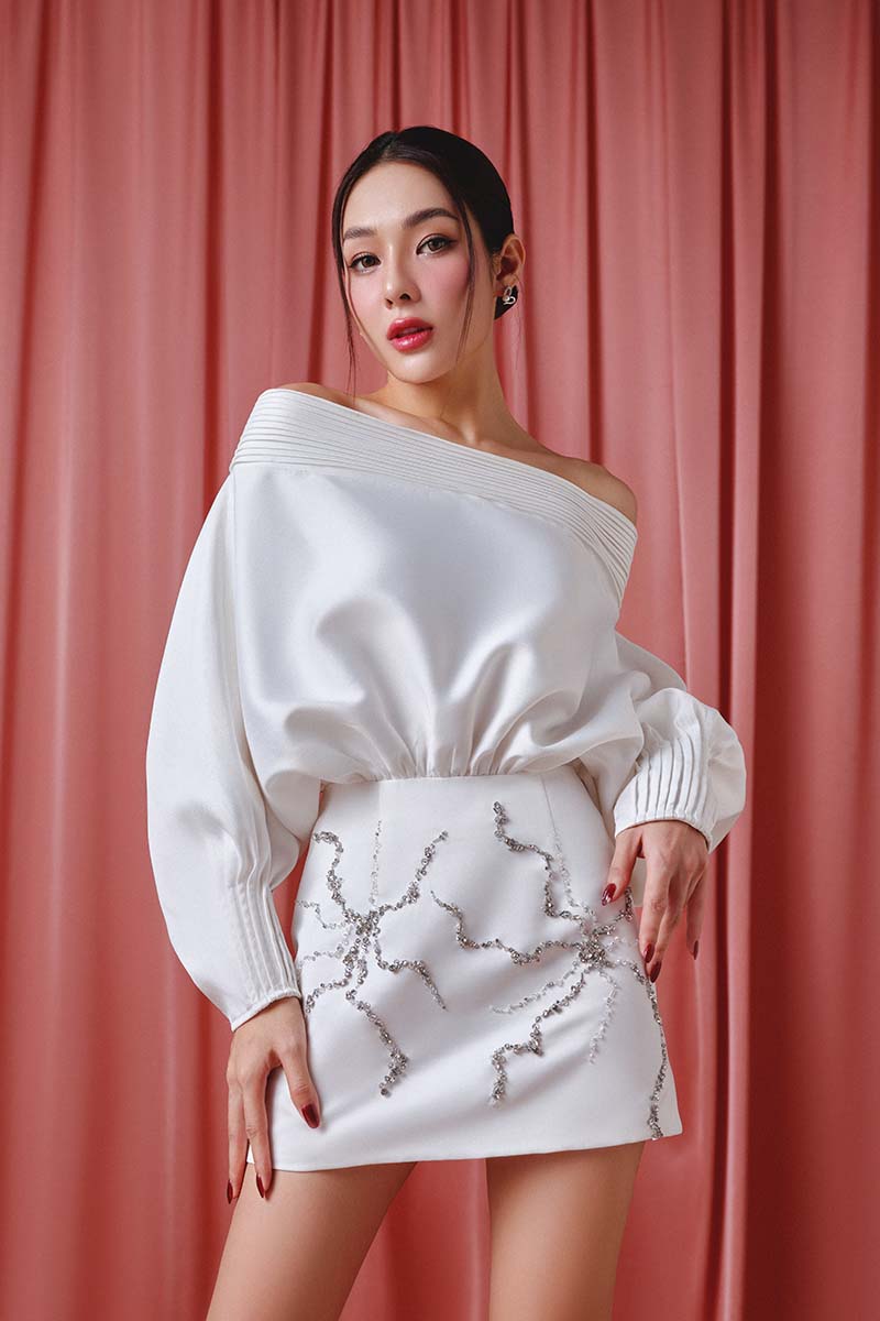 Ivory Grace mini dress by Do Long, stylish women's mini dress with a fitted silhouette and elegant design.