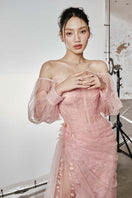 Do Long CULT MIA X DO Long Veil of Dawn gown, elegant formal gown with intricate detailing and flowing fabric.