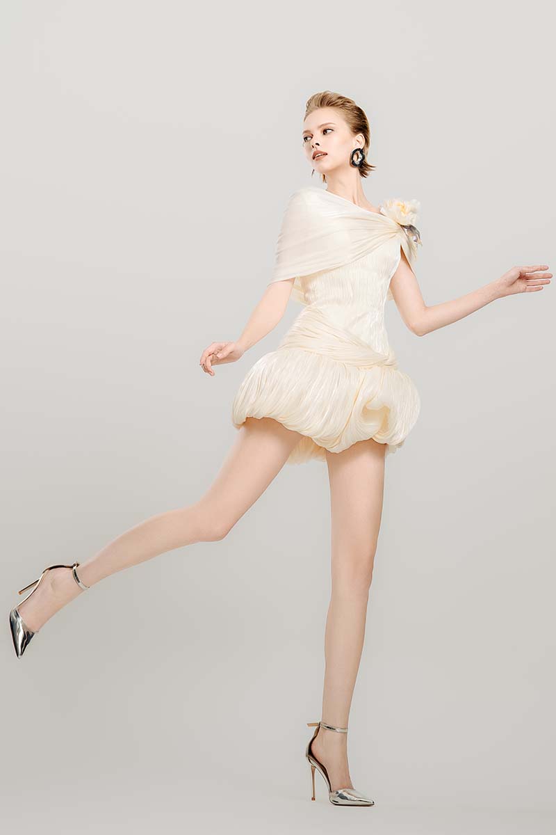 Do Long Falling Petals mini dress shown in a stylish floral print mini dress with a fitted silhouette and short sleeves.