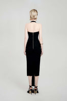 Black mystery midi dress by Do Long, stylish midi dress with a sleek silhouette and elegant design, shown on a mannequin.