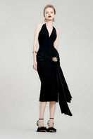 Black Mystery midi dress by Do Long, showcasing a stylish mid-length dress with a fitted silhouette and elegant design.