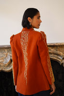 Nadya Shah Artemis jacket shown from the back, featuring a stylish design with a fitted silhouette and high-quality fabric.