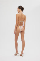 Shiny pink Aruna bikini set by Maliluha featuring a stylish bikini top and bottom with a vibrant print.
