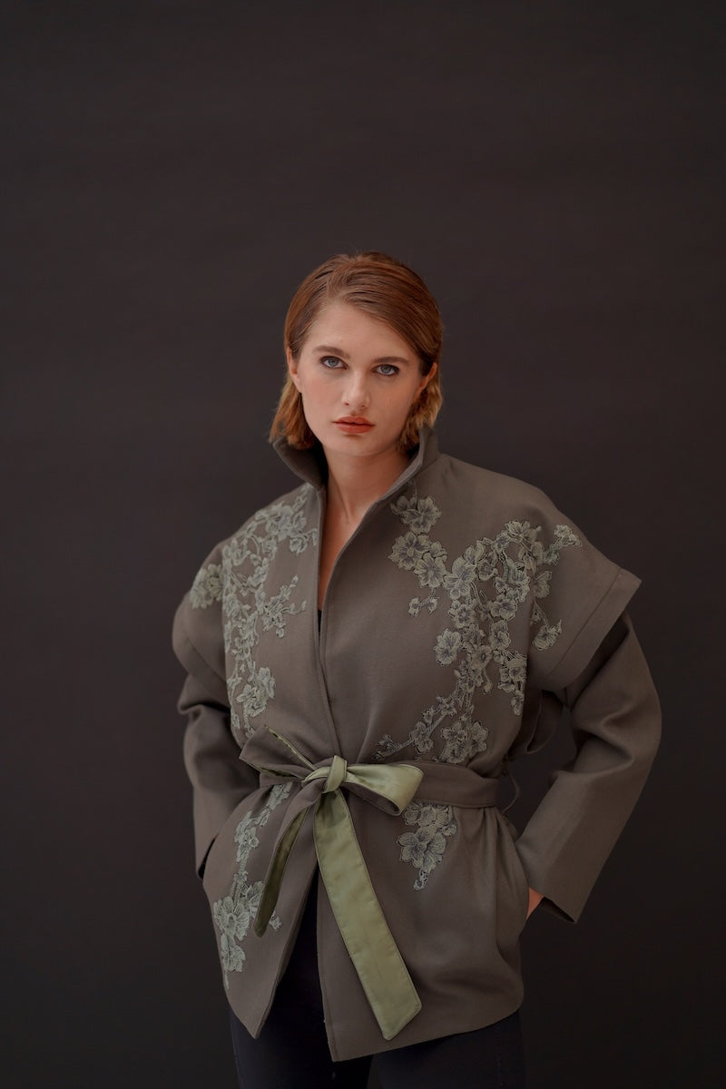 Nadya Shah Ash Bloom belted jacket featuring a stylish design with a belt at the waist and a modern, fashionable look.