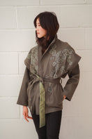 Nadya Shah Ash Bloom belted jacket featuring a stylish design and belt detail, displayed on a mannequin.