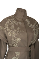 Nadya Shah Ash Bloom belted jacket with floral pattern and front belt detail, stylish outerwear for a modern look.