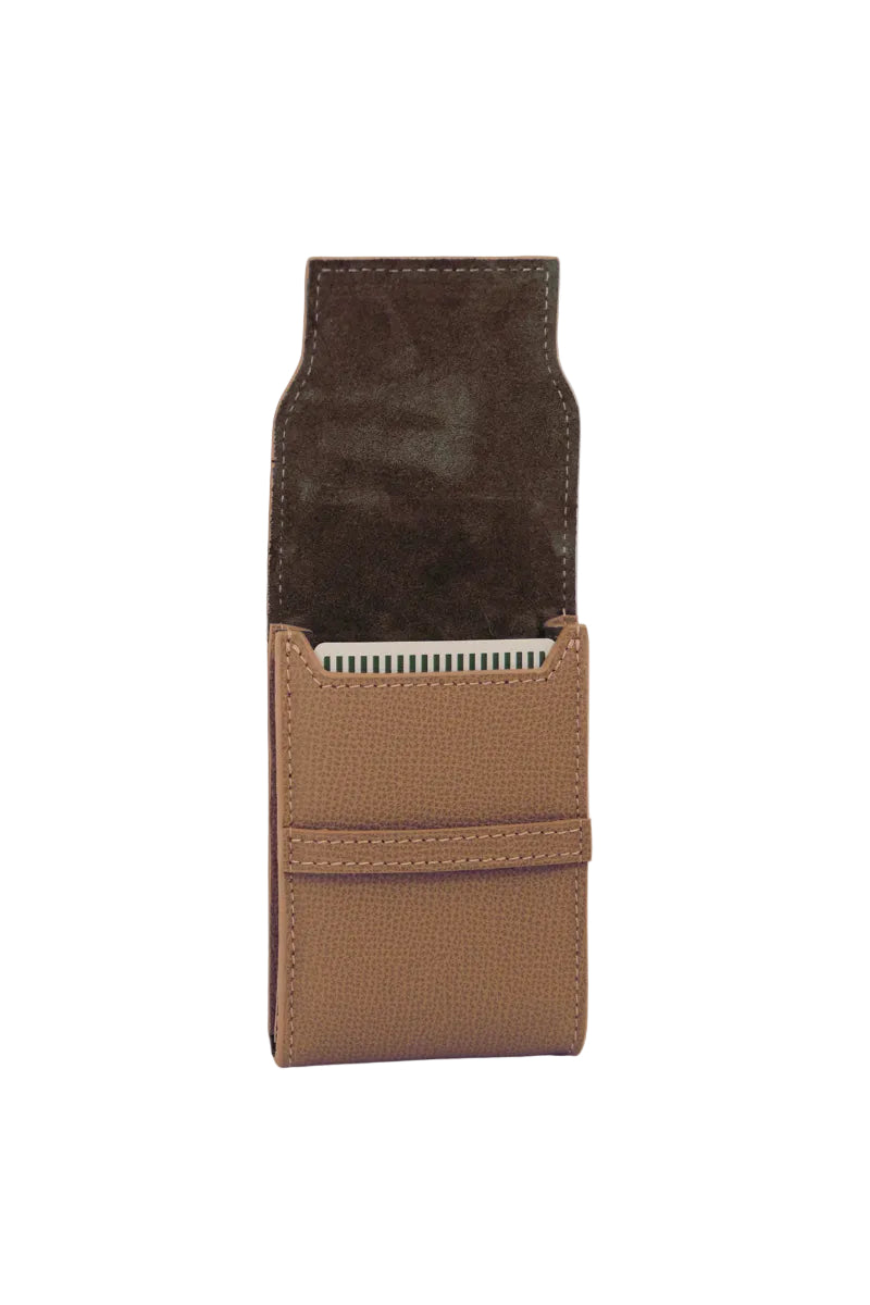 Leather playing card set in Aspen design by Throwing Doubles, featuring open cards on a wooden surface.