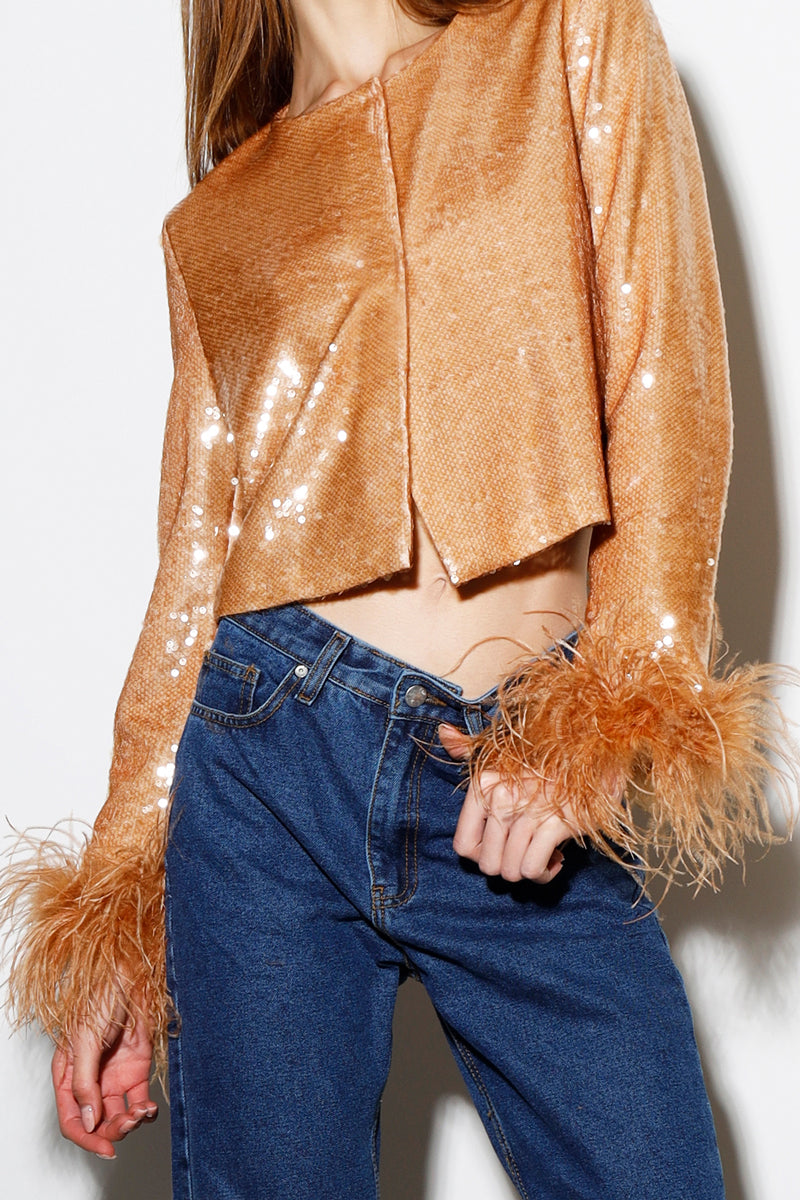 Rayane Bacha Astra Sequin Feather Vest in honey golden, a stylish jacket with shimmering sequins and feather detailing.