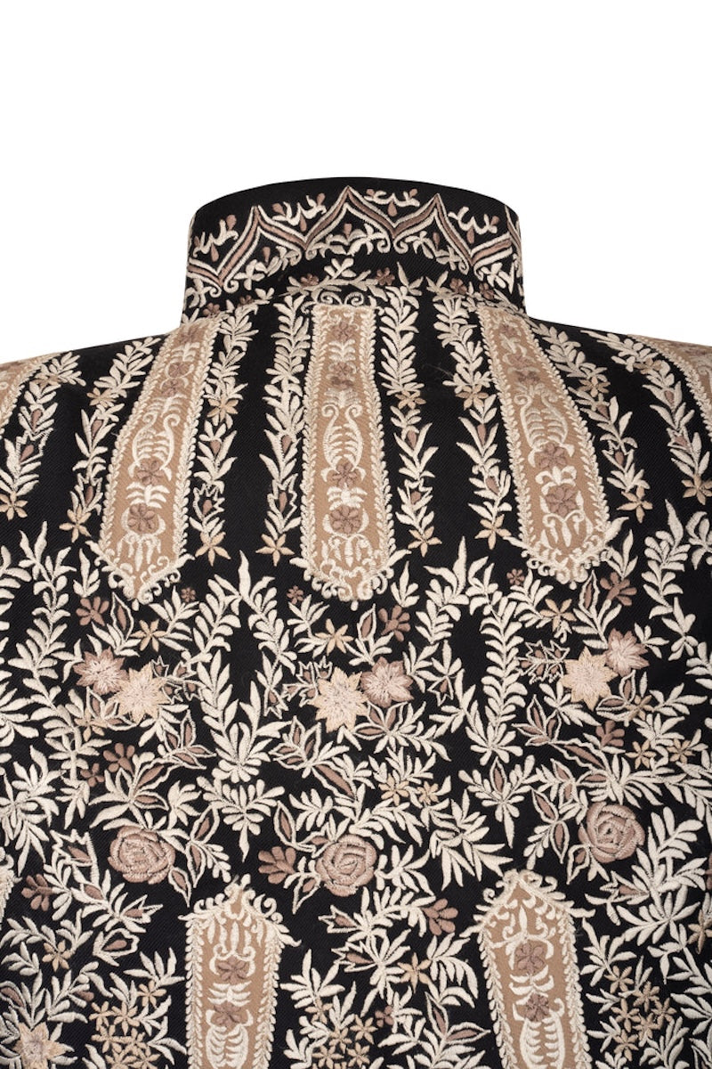 Back view of Nadya Shah Astrid in Byzantine cape jacket with intricate detailing and elegant design.