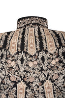 Back detail of Nadya Shah Astrid in Byzantine jacket, showcasing intricate embroidery and flowing fabric design.