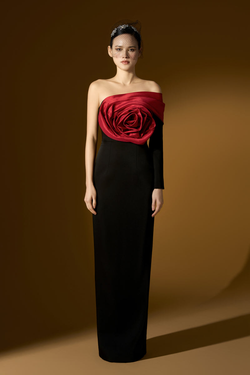 Red I.H.F gown featuring a rose crepe and taffeta design with an asymmetric column silhouette and elegant draped details.