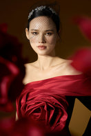 I.H.F red rosette crepe and taffeta gown with asymmetric column silhouette and draped rose detail.