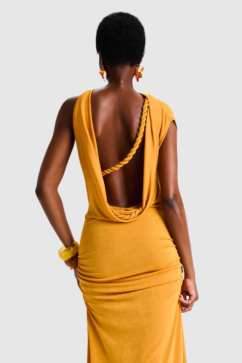 BBXBRAND asymmetric Niyah maxi dress in sweet pineapple print, flowing fabric and stylish design, perfect for summer occasions.