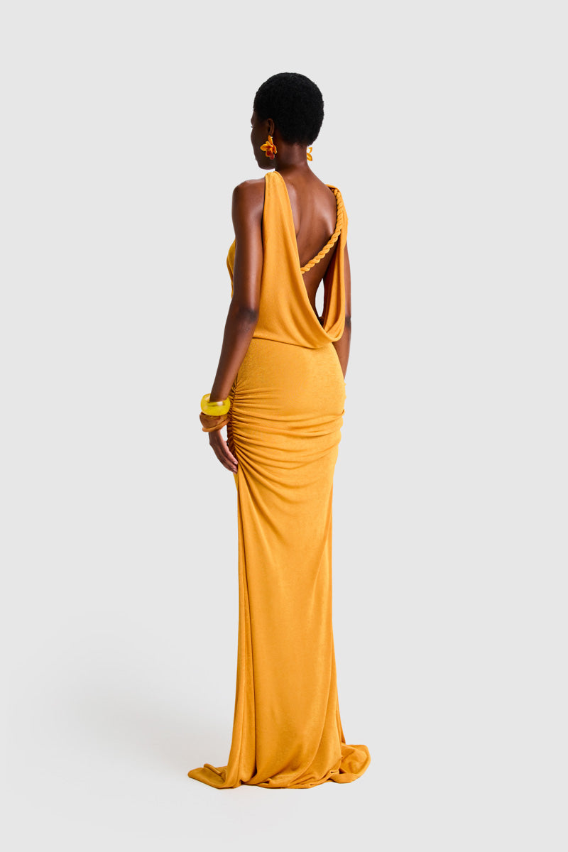 BBXBRAND asymmetrical Niyah maxi dress in sweet pineapple print, flowing fabric and stylish design for elegant summer wear.