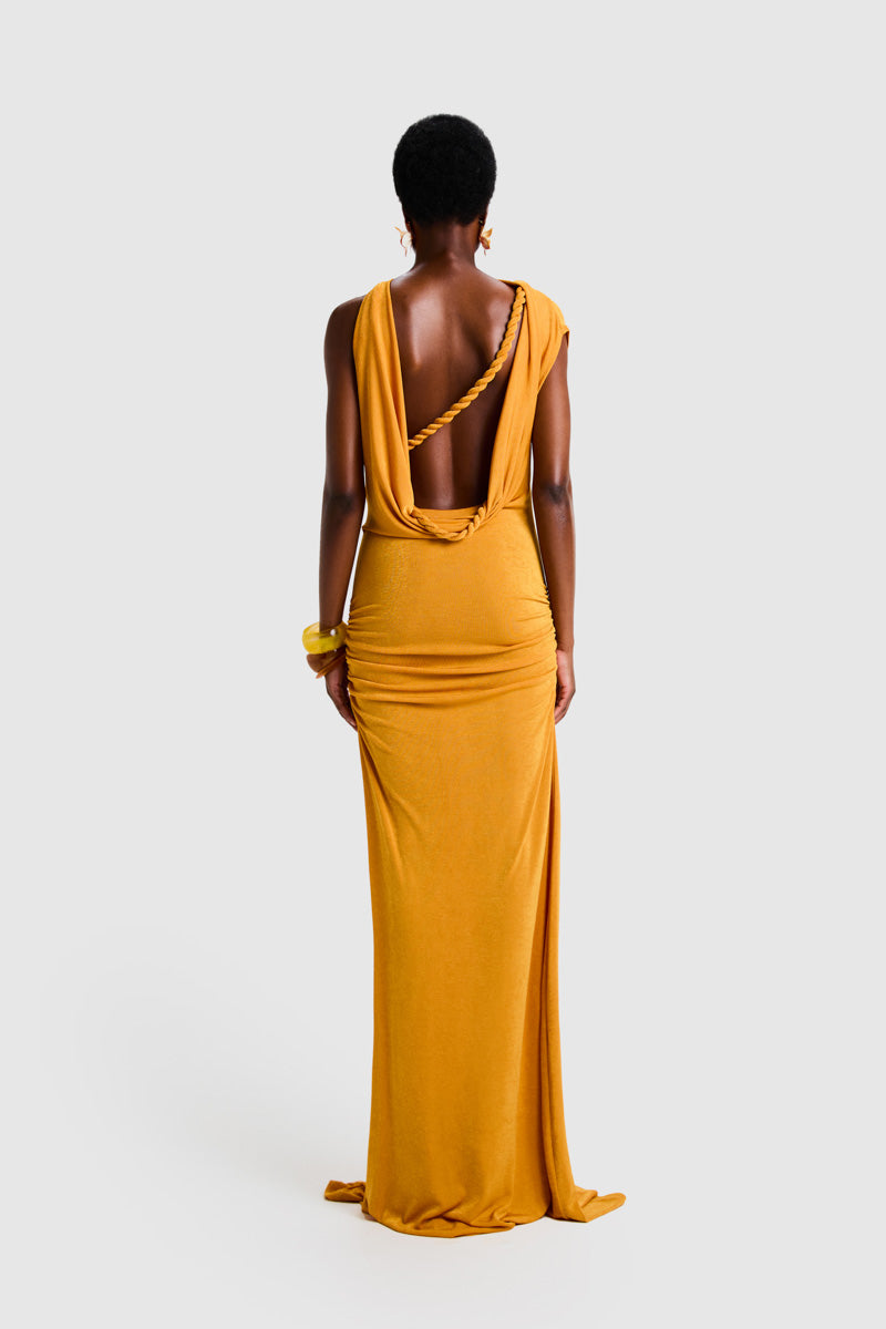 BBXBRAND asymmetric Niyah maxi dress in sweet pineapple print, flowing fabric, and stylish asymmetric hem detail.