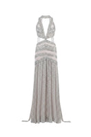 Rayane Bacha Athéa Gown in silver, elegant evening gown with intricate details, flowing fabric, and sophisticated design.