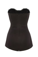 Nana Jacqueline Athena black jumpsuit shown from the back, featuring a sleek, fitted design with a stylish neckline and full-length legs.