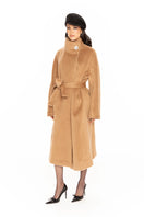 Nana Jacqueline Audrey camel coat, long stylish outerwear with a tailored fit, shown in a sophisticated lookbook image.