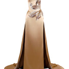 Rayane Bacha Aurea Gown in gold with elegant design and flowing fabric, showcased on a mannequin.