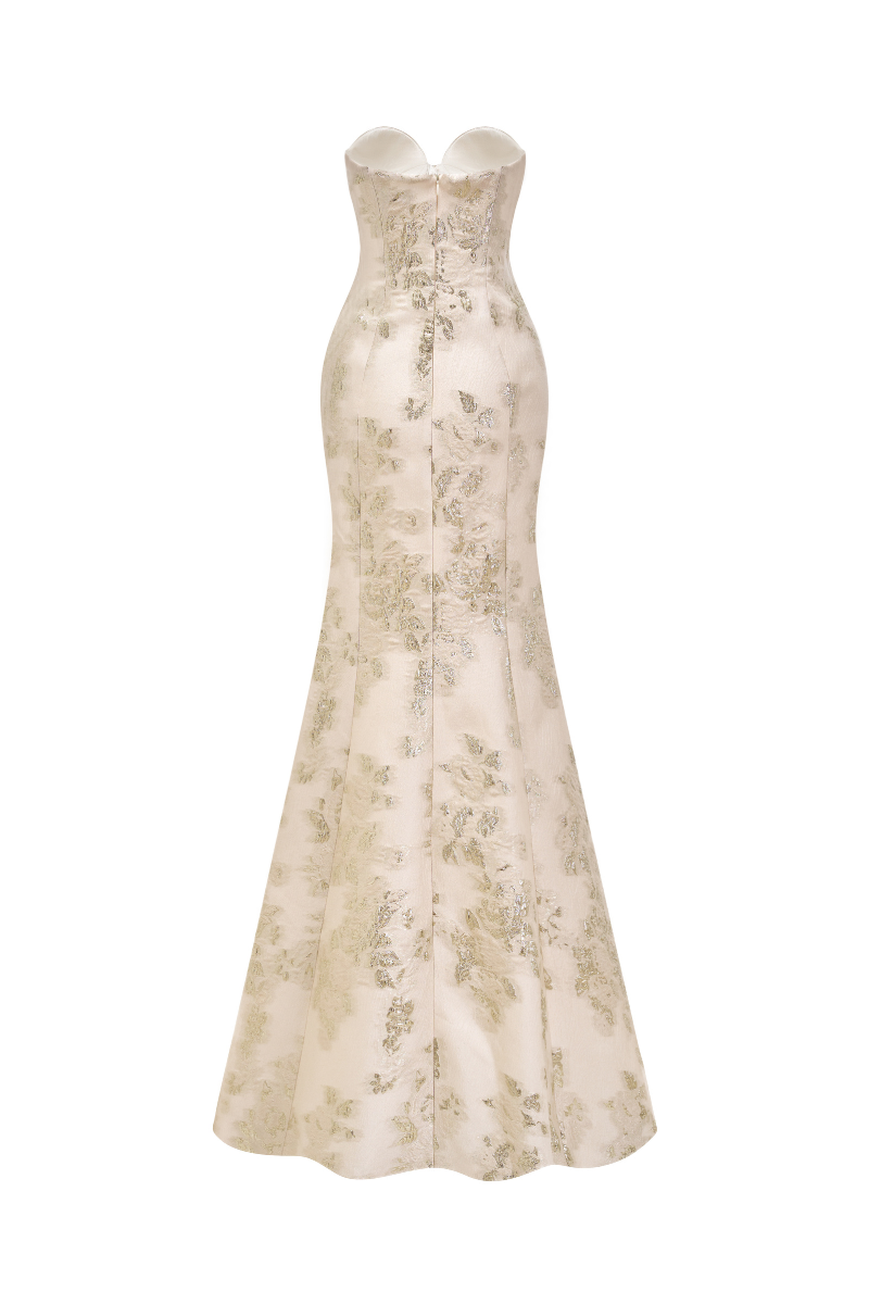 Elegant Aurelia floral mermaid gown by Margée Atelier featuring a fitted silhouette and flowing fabric for formal occasions.
