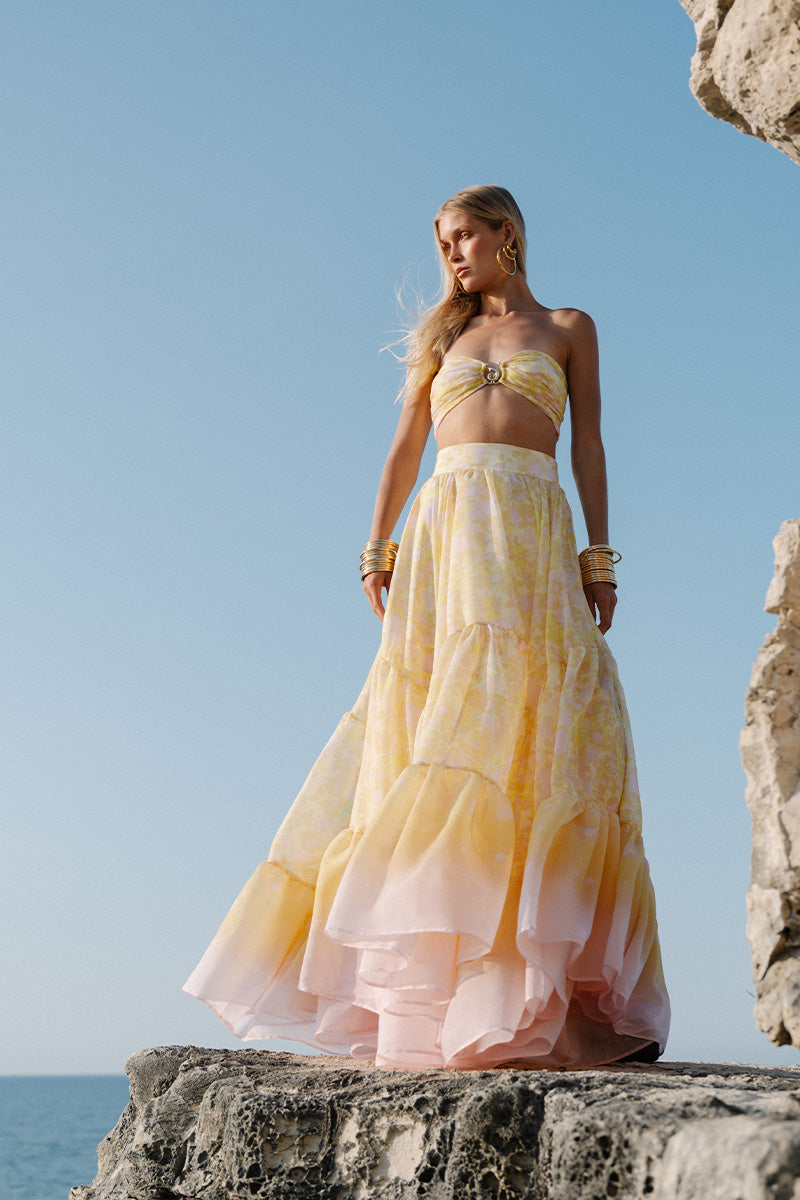 Gigii's Aurora Gialla co-ord set featuring a bandeau top and matching skirt in vibrant yellow fabric.