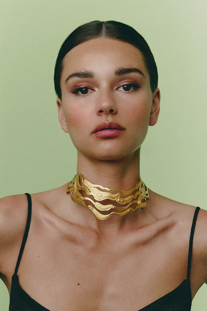 Gold Aurora Choker necklace by Jude Benhalim featuring a sleek, modern design with a luminous, celestial-inspired aesthetic.