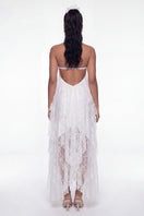 White Aurora lace maxi dress by Nana Jacqueline featuring a halter neckline and intricate lace details.