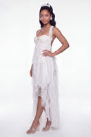 White Aurora lace halter maxi dress by Nana Jacqueline, flowing fabric and intricate lace details, perfect for elegant occasions.