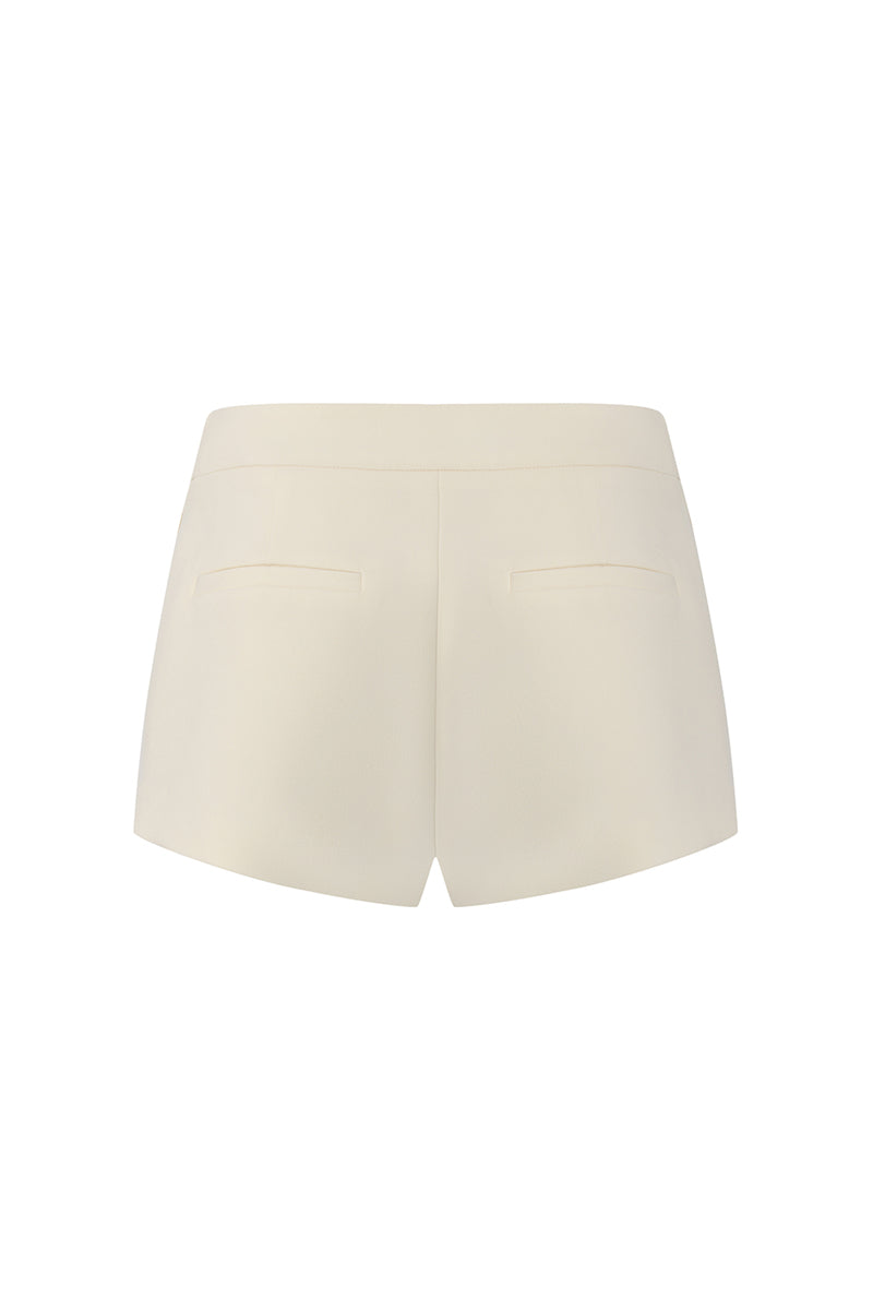 Nana Jacqueline Avalon shorts in champagne color, straight-fit design, shown from the back view.