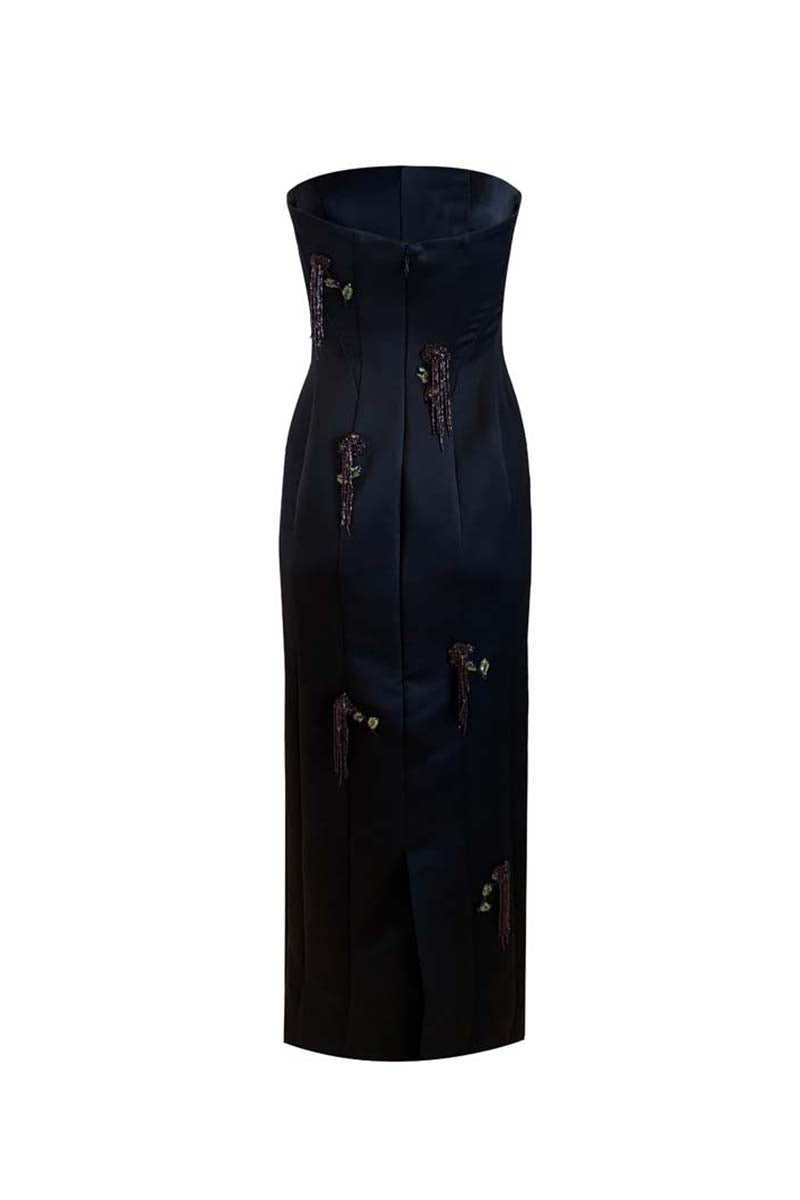 Black Axis gown by Yassmin Saleh featuring a midi length and ghost back design, elegant and flowing for formal occasions.