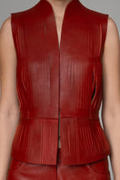 Red leather vest from the AYLA II collection by Double A, featuring a stylish and fitted design.