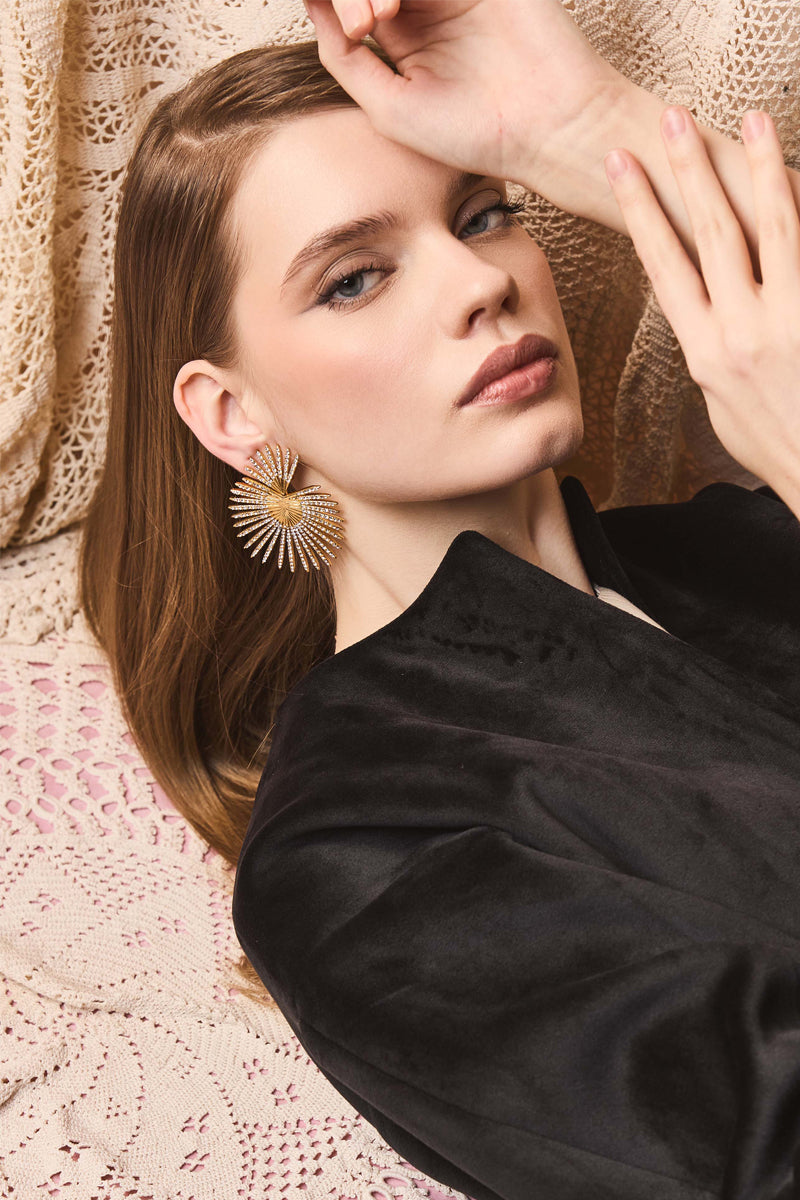 Gold B.O Astra earrings by Jessica K featuring sleek, modern design with a polished finish and elegant hoop style.