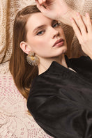 Gold B.O Astra earrings by Jessica K featuring sleek, modern design with a polished finish and elegant hoop style.