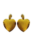 Jessica K B.O Cora Gold Earrings featuring elegant, shiny gold hoops with intricate design details.