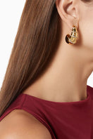Jessica K B.O INORA earrings in white, stylish dangle earrings with a sleek design, perfect for adding elegance to any outfit.