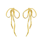 Jessica K B.O Julie earrings featuring stylish hoop design with gold-tone finish, shown on a white background.